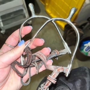 pair of spurs/leathers included